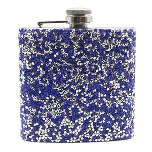 Detailed macro view of a square hip flask with shimmering blue and silver rhinestones