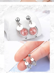 Macro detail of natural strawberry quartz earrings in silver metal with size comparison