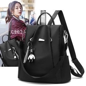 Classic black oxford cloth water-resistant backpack for women with bear keychain charm