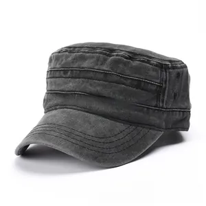 Detail of washed black cotton cadet cap with horizontal stitching and metal eyelets