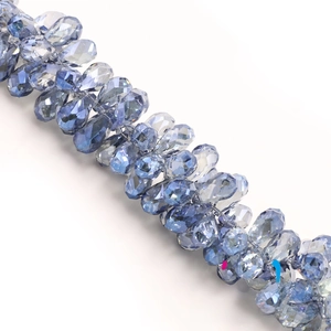 Macro detail of faceted blue teardrop crystal beads for DIY jewelry and necklaces