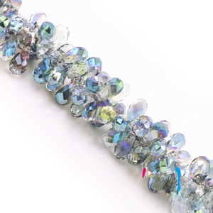 Macro detail of faceted AB teardrop crystal pendants for DIY jewelry design