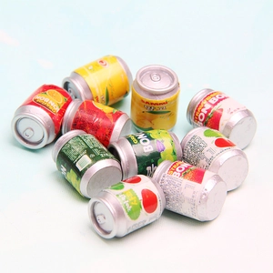 Macro view of 10-piece mini assorted fruit juice soda can charms for DIY crafts