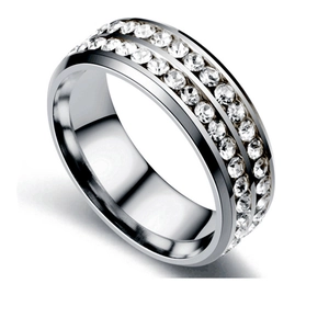 Detailed macro view of silver titanium steel ring featuring double rows of clear zircons