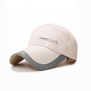 Beige outdoor sports baseball cap with long brim and modern printed logo on white background