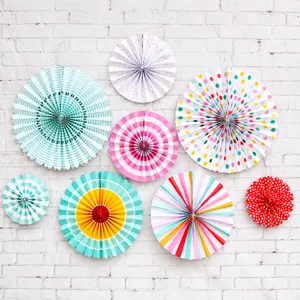 Detail of 8-piece gold foil paper fan set with dots and stripes for party wall decoration