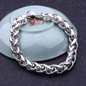 Polished silver dragon bone chain bracelet for men in a wheat weave stainless steel style