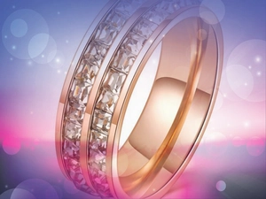 Close-up of rose gold titanium ring with double row of square-cut zircon stones