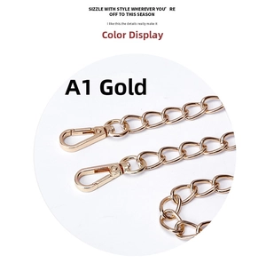 Detailed close-up of golden metal chain strap with polished lobster clasps for handbags