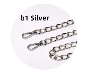 Close-up of polished silver metal handbag chain strap featuring dual lobster clasps