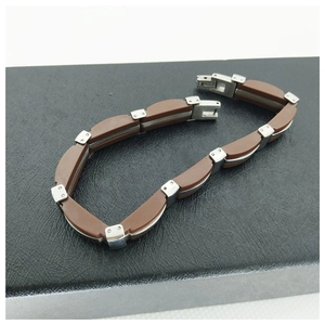 Fashionable men's stainless steel and brown leather cord bracelet with metal fold-over clasp
