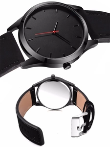 Detailed view of black quartz watch featuring a striking red second hand and matte strap