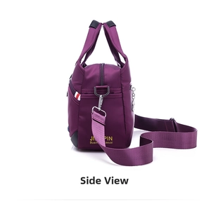 Side view showing zip pocket and adjustable strap of waterproof purple Oxford bag