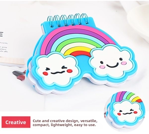 Miniature rainbow spiral notebook with silicone smiley cloud cover and blue metal coil