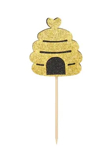 Glittery gold honeycomb cake topper with heart detail for kids birthday party decoration