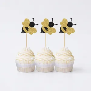 Glittery bee cupcake toppers for birthday parties and dessert table decorations