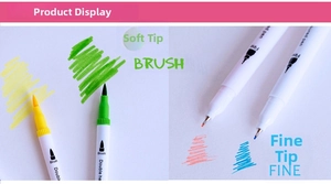 Detailed view of dual-tip markers showing soft brush and fine nib calligraphy strokes