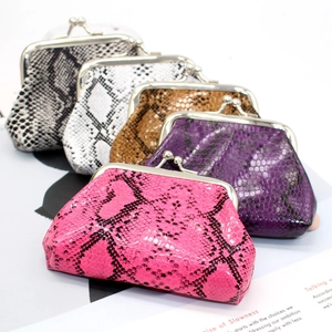 Close-up of PU snake skin texture and metal clasp on vintage small wallets in multiple colors
