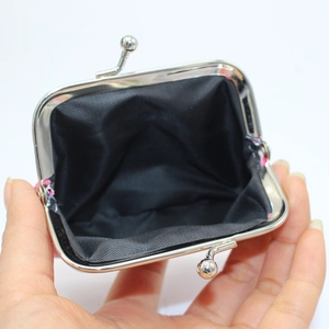 Pink faux leather snake skin coin purse with vintage metal frame and silver ball clasp