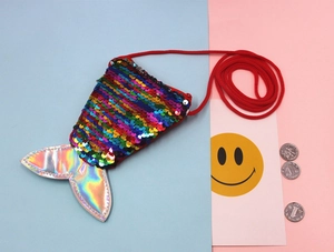 Detail of mermaid tail coin purse with rainbow sequins and silver laser fins