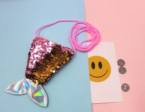 Detailed view of pink sequins mermaid tail coin purse with holographic fin and cord