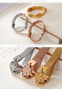 Detailed macro view of mesh band bracelets in silver, gold, and rose gold finishes