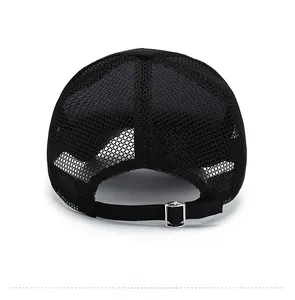 Detail of breathable honeycomb mesh fabric and adjustable metal buckle on black sun hat