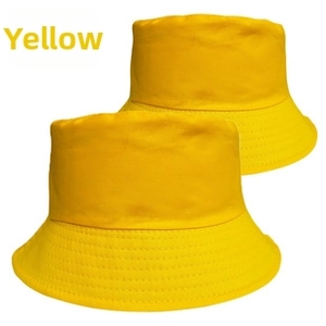 Close-up of a yellow cotton bucket hat with parallel reinforced stitching on the brim