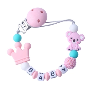 Pink and mint green silicone baby pacifier clip with cartoon koala and crown beads