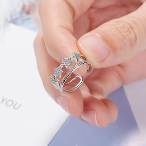 Sparkling silver double layer star ring with micro-pave zircons and braided band detail