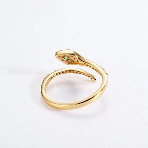 Minimalist gold snake ring with green emerald head and pavé diamonds for women