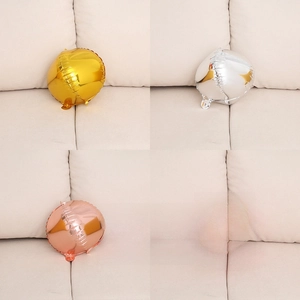 Detail of 4D round aluminum foil balloons in gold, silver, rose gold, and red metallic finish