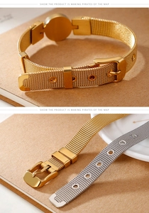 Detail view of gold and silver mesh steel bracelets with classic buckle and strap texture
