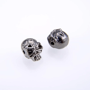 Vintage silver skull beads for DIY jewelry making with realistic carved details and side holes