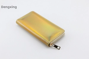 Close-up of holographic gold PU leather wallet featuring metallic gradient and zipper detail