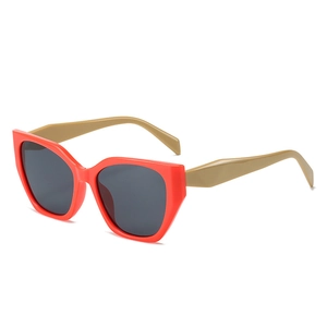 Lunettes de soleil œil de chat orange rétro avec branches beige et verres gris foncé