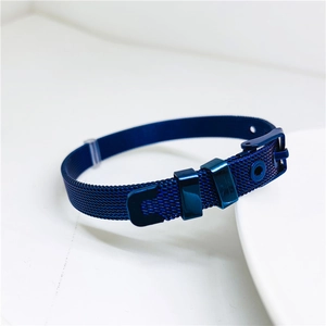 Detailed view of dark blue stainless steel mesh bracelet with adjustable belt buckle closure