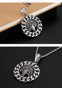 Détail du pendentif Arbre de Vie en acier vintage avec sa chaîne tressée assortie