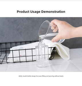 Detail showing easy filling process of the wide-mouth clear plastic dispenser bottle