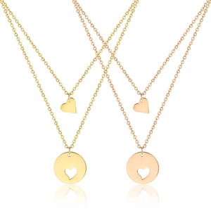 Dual-layer 18K gold and rose gold necklaces featuring heart pendants and round charms