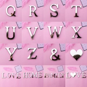 Detailed mirror silver acrylic alphabet letters Q-Z on pink background with heart icon