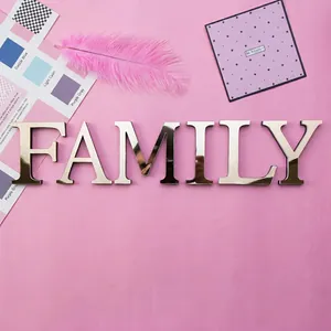 Mirror gold acrylic wall stickers spelling FAMILY for modern home decor decoration
