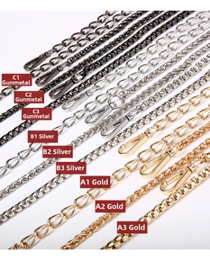 Detail of metal chain straps in gold, silver and gunmetal with lobster clasps for handbags