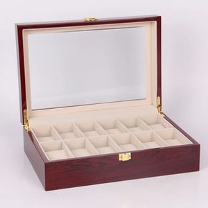 Detail view of 12-slot wooden watch box with soft beige velvet lining and gold metal latch