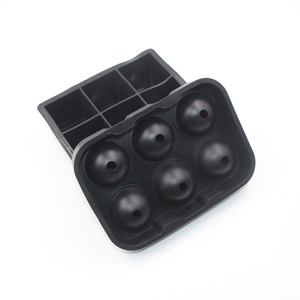 Detail view of black food-grade silicone molds for square and spherical ice cubes