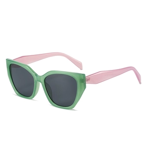 Lunettes de soleil œil de chat rétro avec monture verte et branches rose clair pour femme