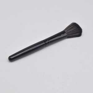Single professional black blush brush with soft synthetic bristles for face makeup