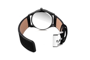 Detailed back view of round business watch with black leather strap and steel buckle
