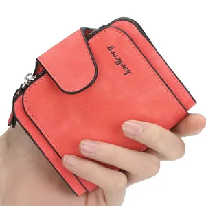 Women's pink frosted leather short wallet with snap closure and dual zipper compartments