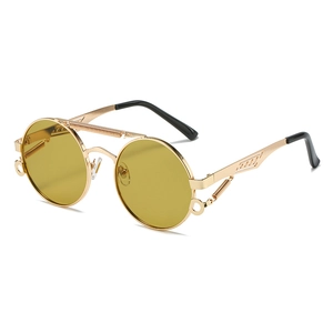 Steampunk round sunglasses with gold metal frame and mechanical spring temple design
